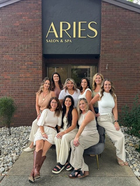 Group of women posing in front of Aries Salon & Spa